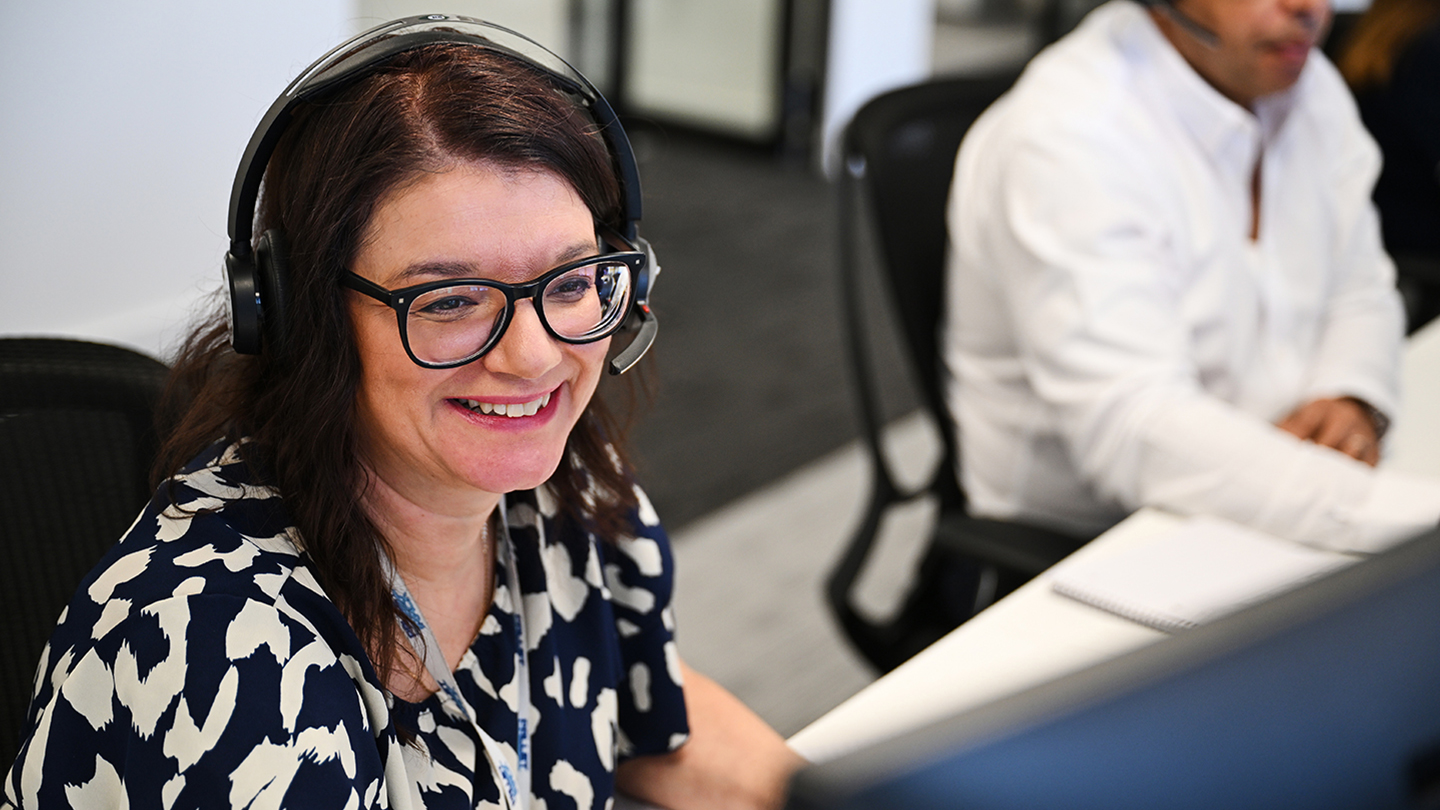 Image of a smiling staff member