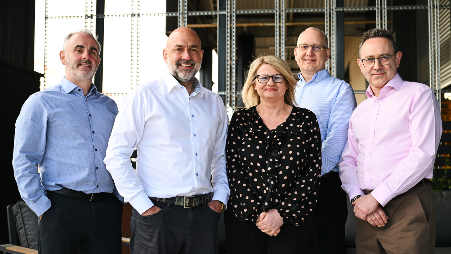 Image of the Pallet-Track leadership team smiling