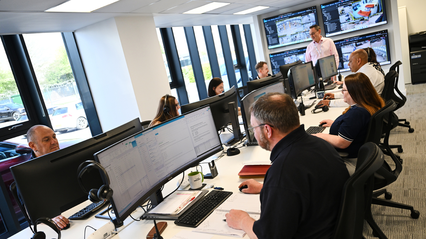 Image showing staff in the office working on PCs